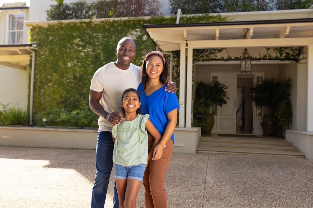 Family at the door of a new home — the underserved ITIN homebuyer market